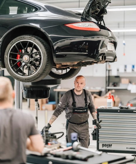 A mechanic at the Porsche workshop